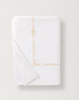 Lisetta Flat sheet with close up detail of the embroidery pattern in the color champagne
