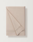 the flat sheet in the color fawn, finished with a double-row hemstitch, adds a touch of formal flair to the super-fine sateen, elevating both the look and feel of the sheet.