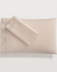 the pillowcase in the color fawn, features the same elegant double-row hemstitch as the flat sheet and is sold in pairs.