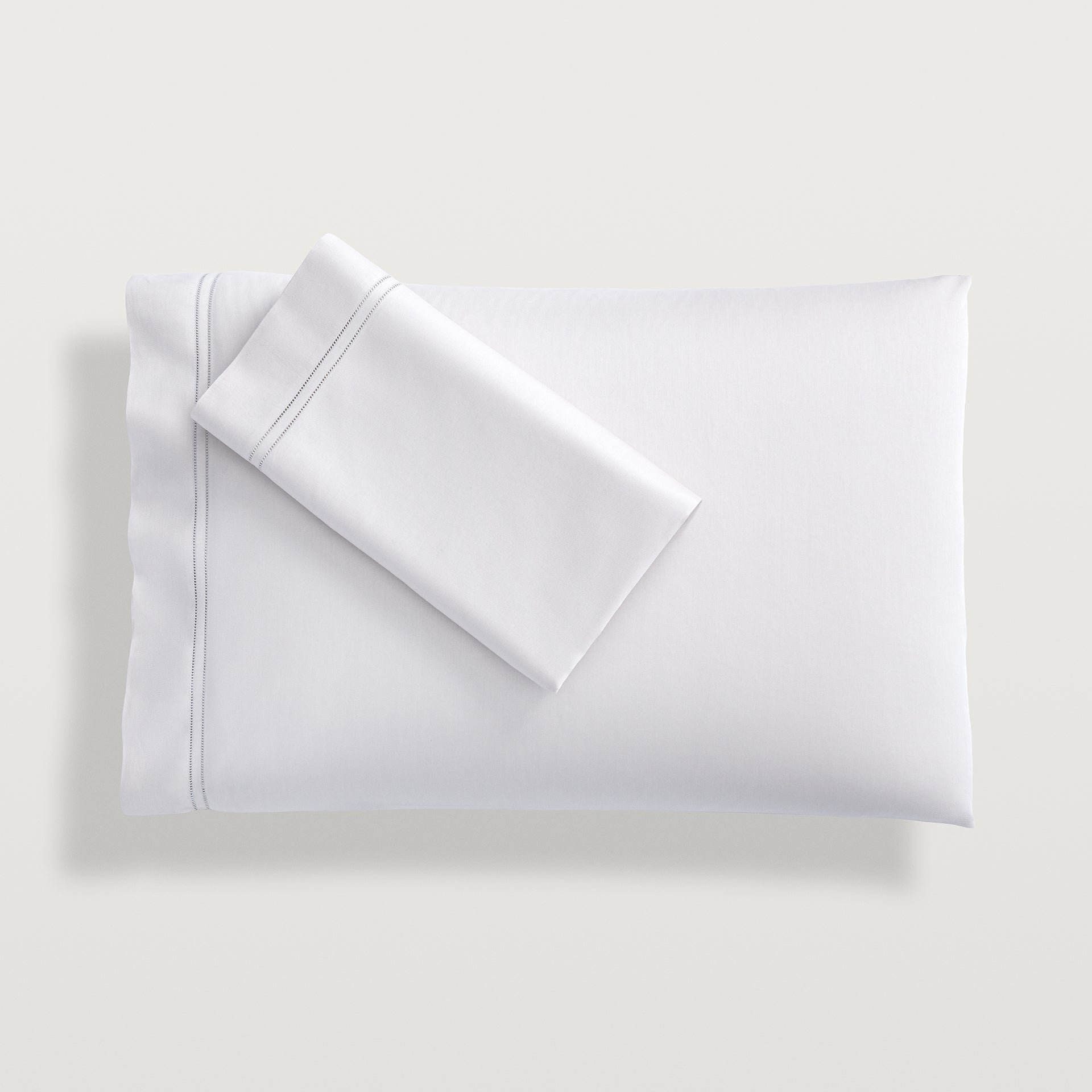 the pillowcase features the same elegant double-row hemstitch as the flat sheet and is sold in pairs.