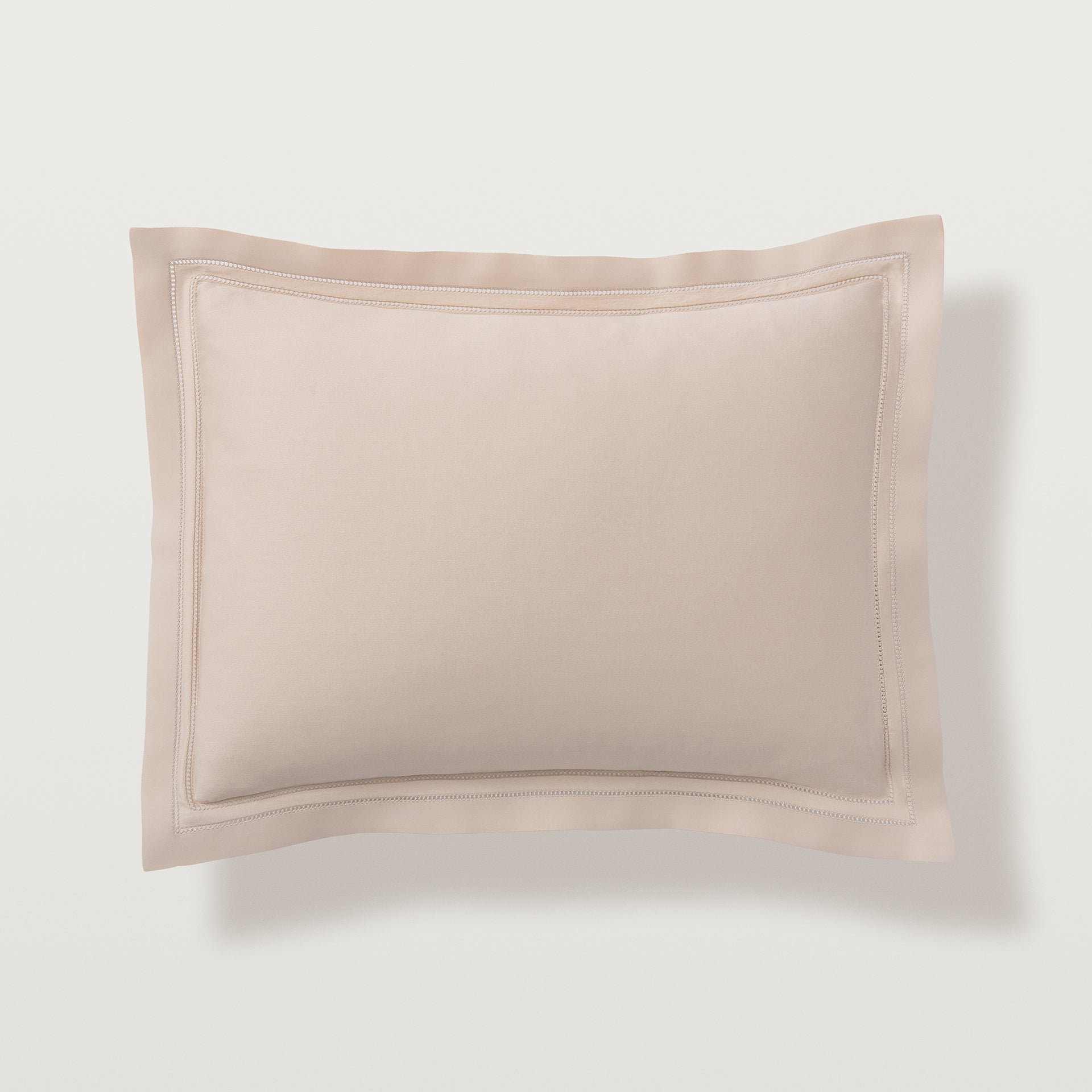 the standard sham in the color fawn has a double-row hemstitch on all four sides. All shams sold separately.