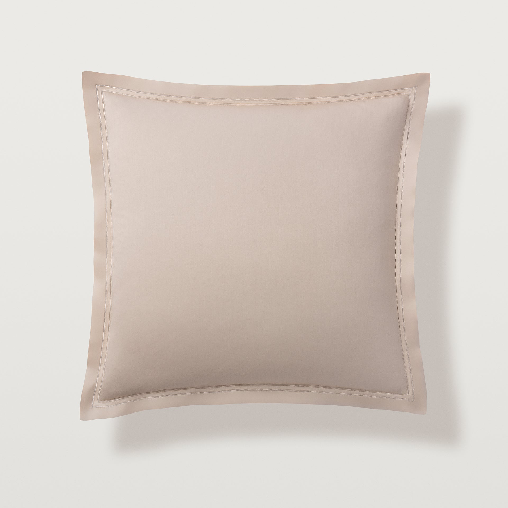 The Euro sham in the color fawn, has a double-row hemstitch on all four sides. All shams sold separately.