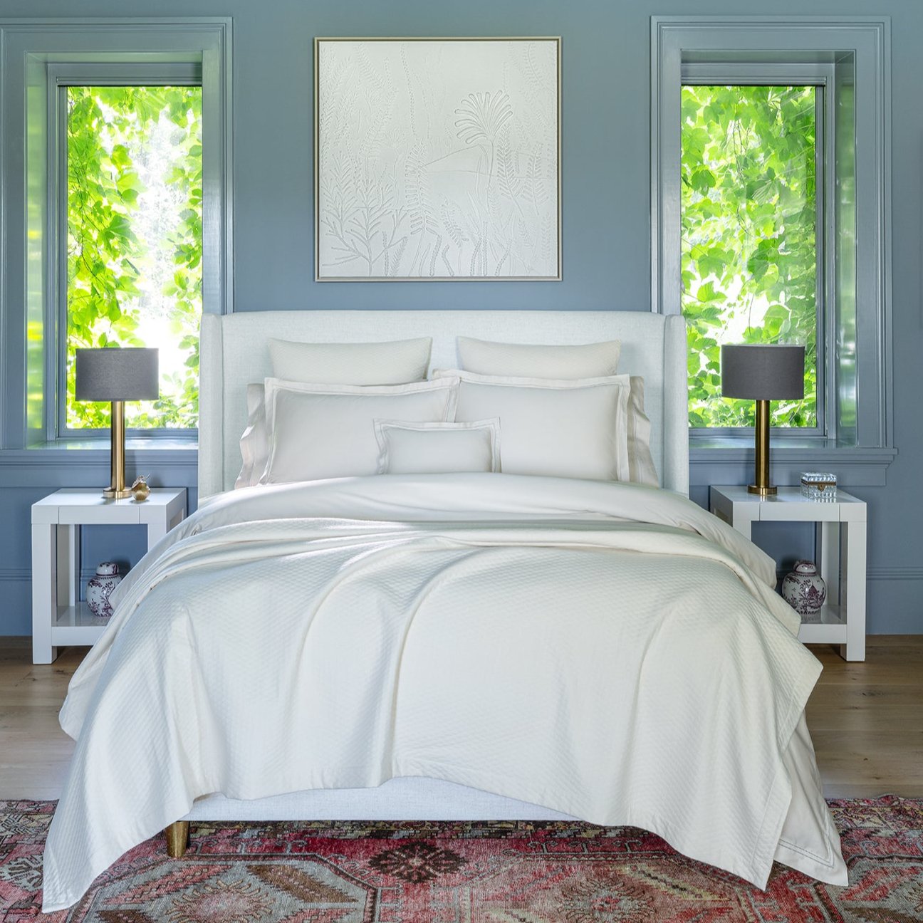full bed shot of Lucea Sea Island in the color fawn paired with Ravello's Euro Shams in Pearl