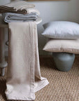Ravello Shams and Coverlets in the colors cove and linen.