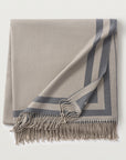 Our Carlyle Throw in the color slate is a beautiful reversible throw made of 70% Lambswool, 20% silk, 10% cashmere and Woven in Italy