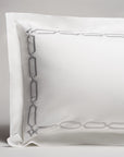 arezzo embroidered sham in the color shadow with a frame style pattern featuring 15" repeats,