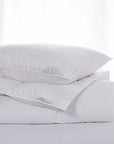 scandia home chamonix pillow on top of folded chamonix comforter