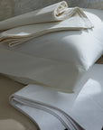 classic natural percale sham offered in classic colors: white and ivory. With hemstitch flanges on on all four sides