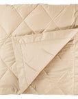 scandia home down blanket in the color café, folded