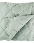 scandia home down blanket in the color heath, folded