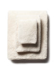 scandia home's indulgence wash, hand, and bath towel folded in the color ivory  