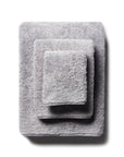 scandia home's indulgence wash, hand, and bath towel folded in the color silver