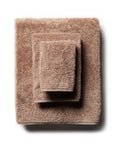 scandia home's indulgence wash, hand, and bath towel folded in the color truffle