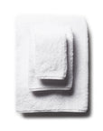 scandia home's indulgence wash, hand, and bath towel folded in the color white