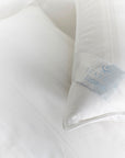 scandia home lucerne pillow close up shot displaying damask stripe detailing and corner silk