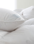 scandia home salzburg pillow close up detail shot of stitching and corner silk detail