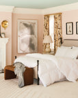 scandia home salzburg down pillows with comforter shown in a bedroom