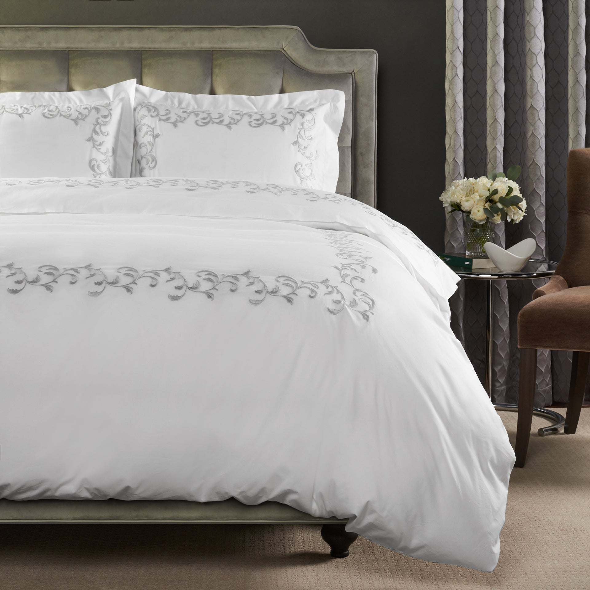 san remo duvet cover with a romantic scroll embroidered detail shown in color shadow &amp; white