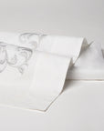 san remo embroidered flat sheet in the color shadow & white. Pattern features 15" repeats, 