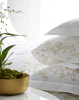 san remo pillowcase showing detail of scroll embroidery detail and hemstitch in the color cornsilk & ivory, 