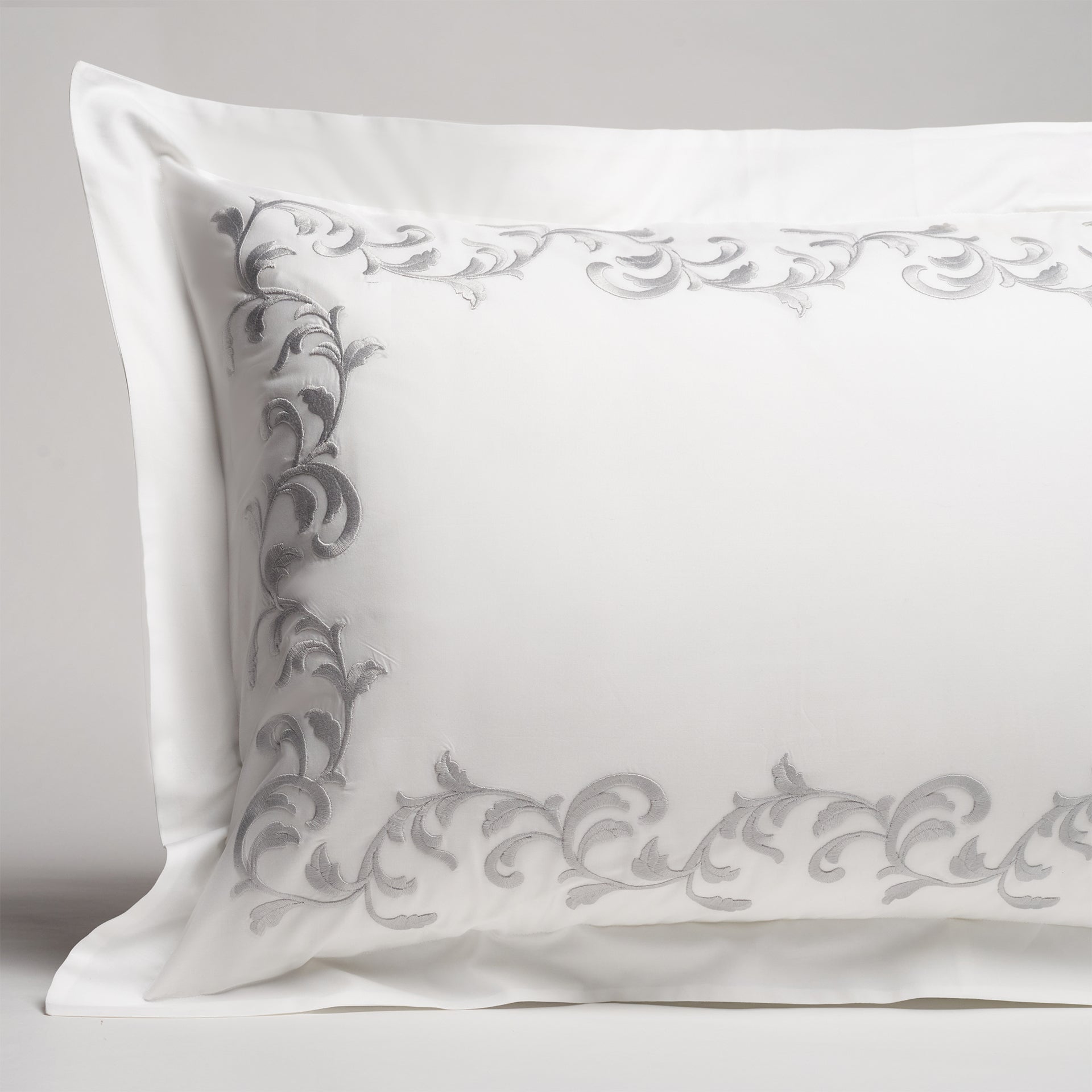 san remo embroidered sham in the color shadow & white with a frame style pattern featuring 15" repeats, #color_shadow & white