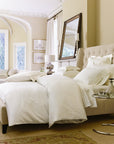 savoia duvet cover has a tone on tone strip patter shown the color ivory