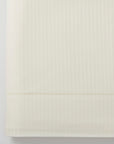savoia stripe sateen detail in the color ivory,