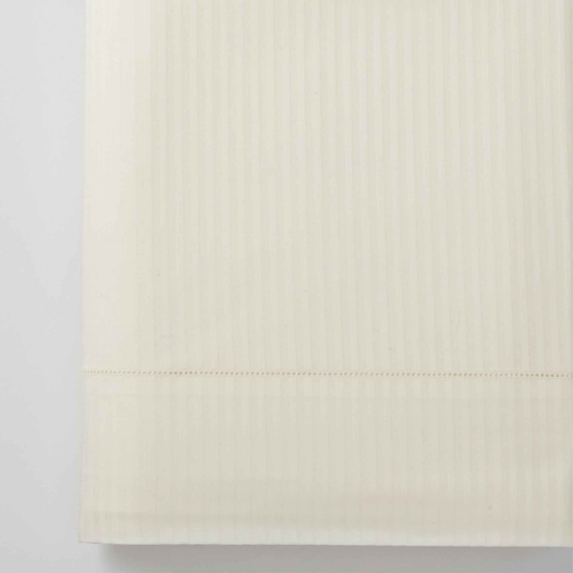 savoia stripe sateen detail in the color ivory,