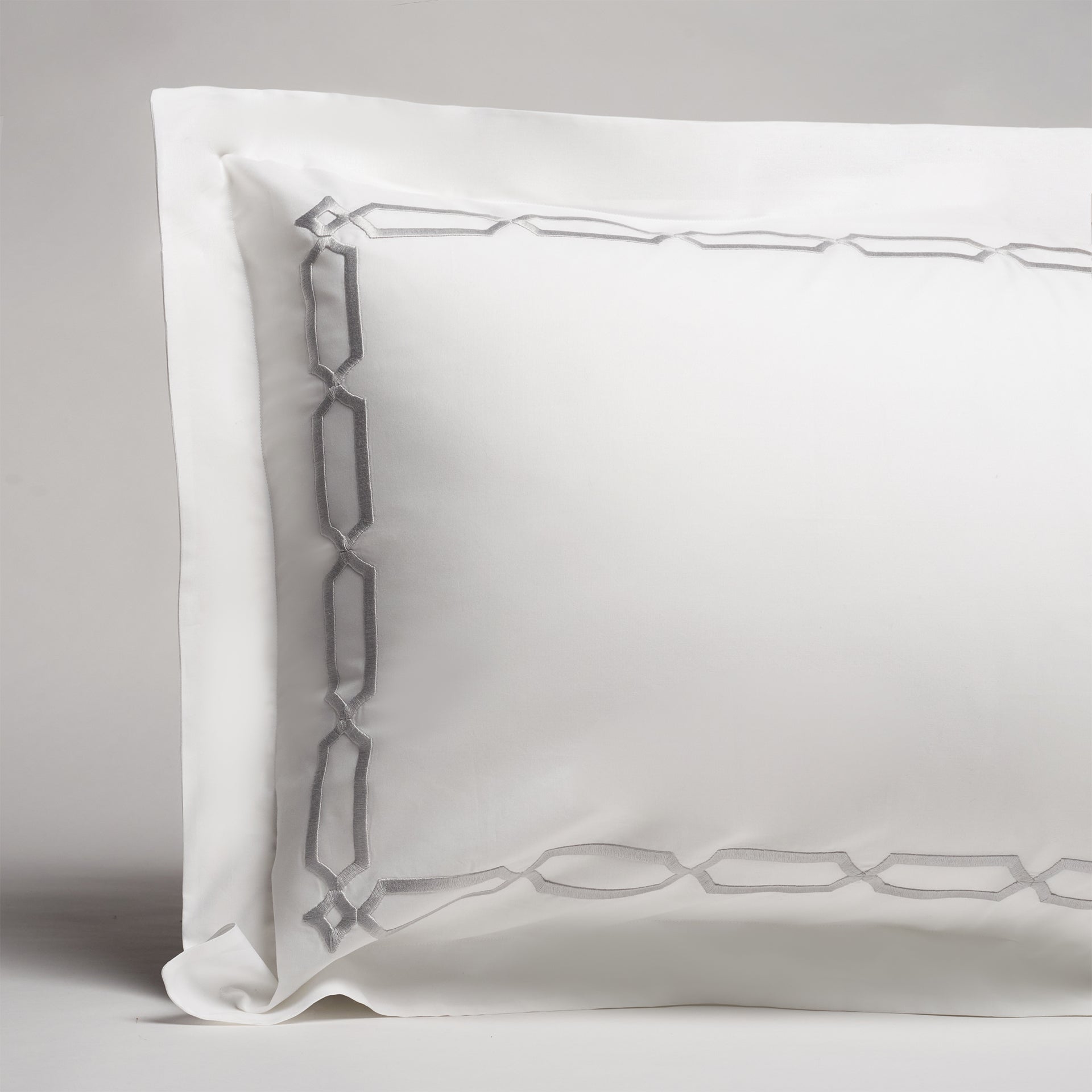 arezzo embroidered sham in the color shadow with a frame style pattern featuring 15" repeats, #color_shadow & white