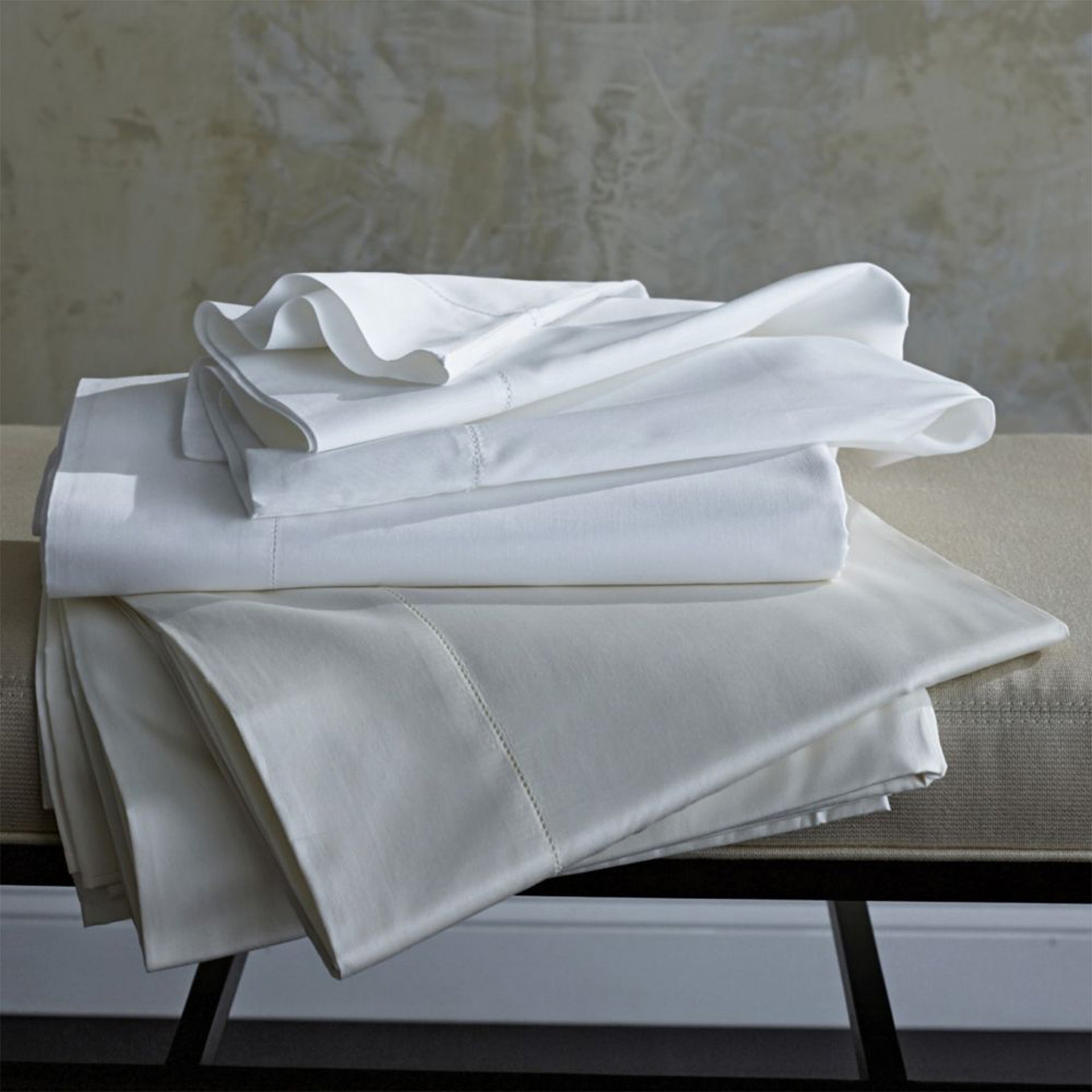 Fitted sheet offered in two classic colors-white and ivory. 