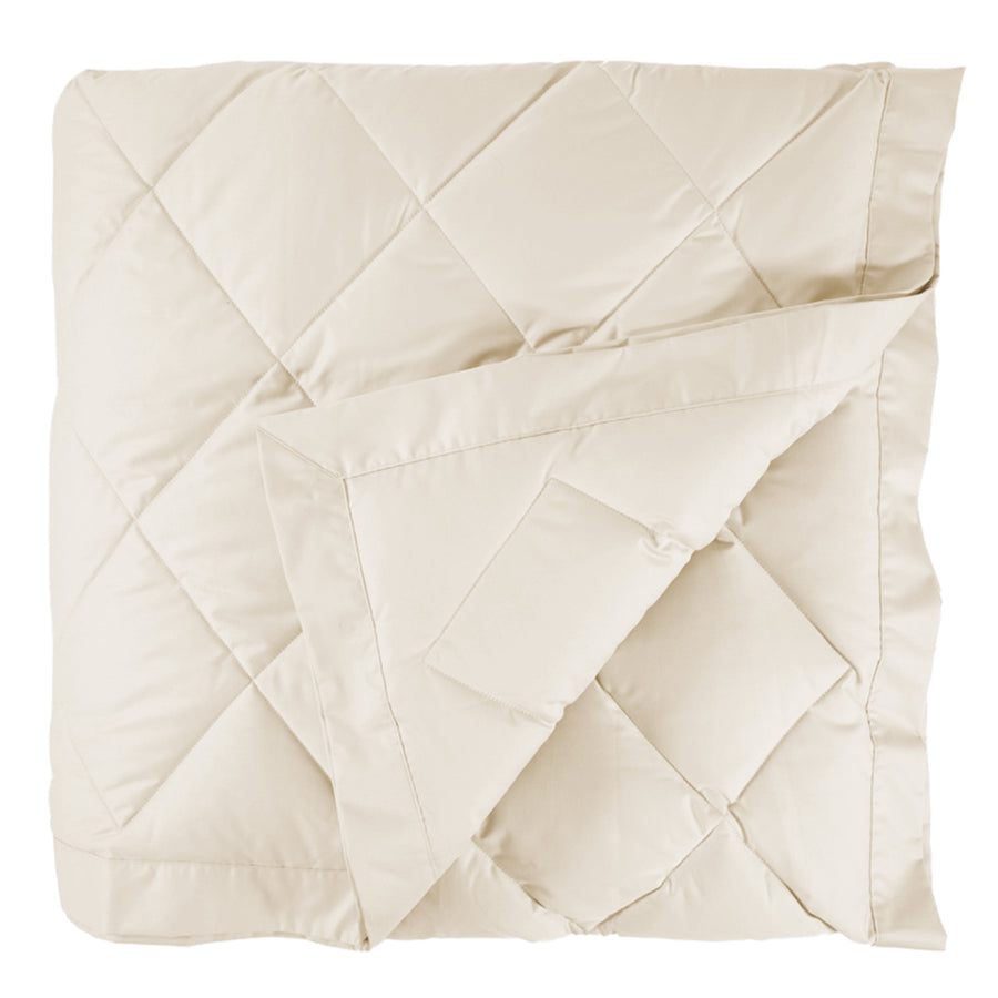 scandia home down blanket in the color ivory, folded #color_ivory