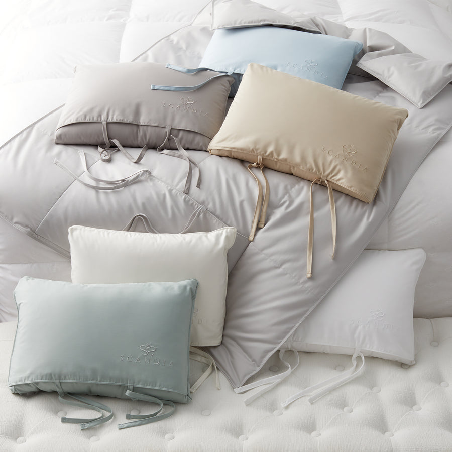 A traveler favorite, the scandia travel attache arrives as a plush pillow that unfolds into a throw comforter size