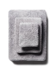 scandia home's indulgence wash, hand, and bath towel folded in the color silver  #color_silver