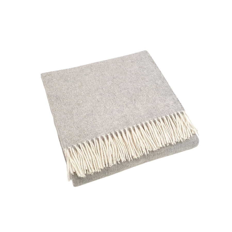 scandia home jaya cashmere throw folded in the color light grey