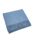 scandia home jaya cashmere throw folded in the color petrol
