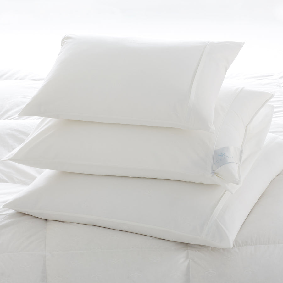Three Scandia Pillows covered with our 200 thread count pillow protectors