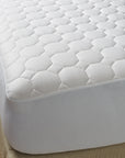The pure cotton mattress pad encloses naturally hypoallergenic cotton batting in a pure cotton shell