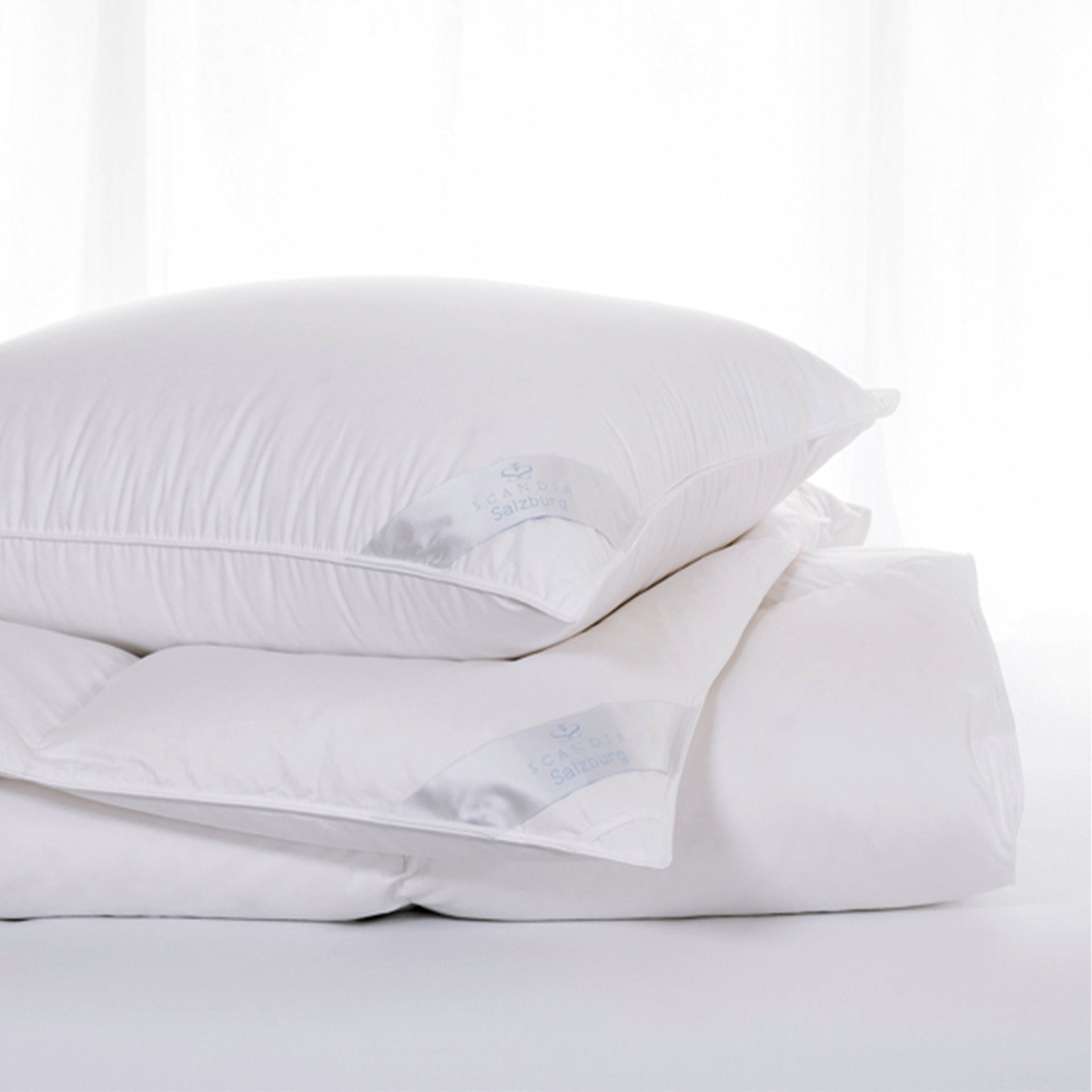 scandia home salzburg comforter folded with salzburg pillow on top