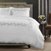 san remo duvet cover with a romantic scroll embroidered detail shown in color shadow & white