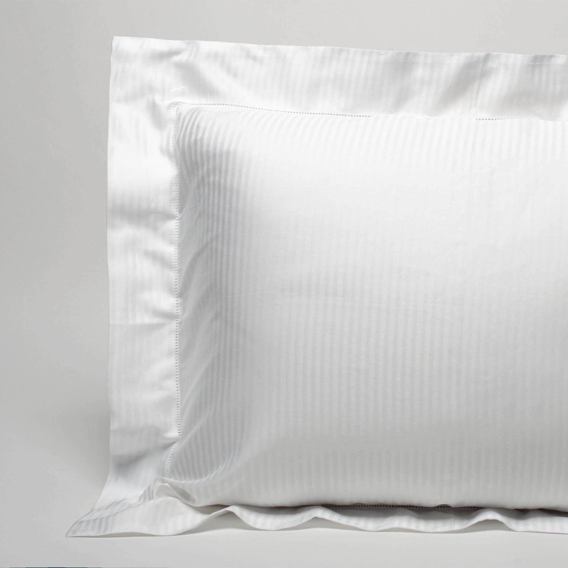 savoia sateen standard, king and euro pillow shams have a 3 inch hemstitch flange on four sides