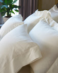 stresa sateen pillowcases in ivory with stresa standard and euro shams