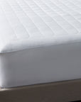 mattress pad is filled with tencel, a fiber known for its absorbency, breathability, and temperature-regulating properties